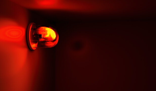 Emergency rotating alarm red light at night. 3D rendered illustration.