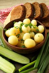 Concept of tasty food with boiled young potatoes