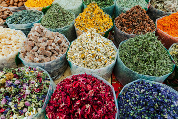 Traditional Azerbaijani cuisine ingredients dried fruit and herbs at the local market in Baku,...