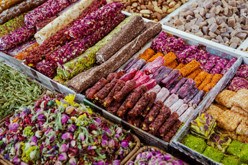 Traditional Azerbaijani cuisine ingredients dried fruit and herbs at the local market in Baku,...