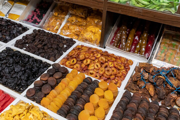 Traditional Azerbaijani cuisine ingredients dried fruit and herbs at the local market in Baku, Azerbaijan.