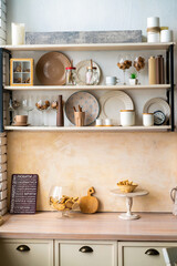 Obraz na płótnie Canvas vintage kitchen interior with utensils