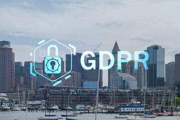 Panorama city view of Boston Harbour at day time, Massachusetts. Building exteriors of financial downtown. GDPR hologram is data protection regulation and privacy for all individuals within EU Area