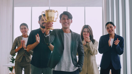 Group of business people are proud to receive an award for a successful project.