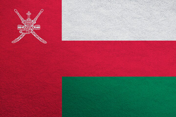 Modern shine leather background in colors of national flag. Oman