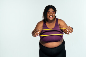 Young woman making pilates and functional training at the gym