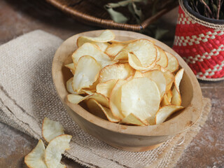 Keripik singkong. Cassava chips or tapioca chips is traditional snack from Java, made of cassava thinly sliced and fried