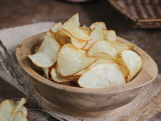 Keripik singkong. Cassava chips or tapioca chips is traditional snack from Java, made of cassava...