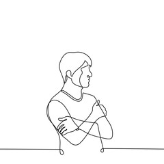 man stands with his hands hugging his shoulders - one line drawing vector. male profile portrait. the concept of self-rescue, self-complacency, insecurity, cold