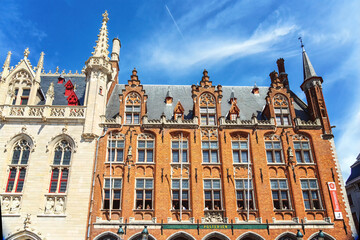 Obraz premium The building of Residence of the Government of Flanders and the Post Office on the Market Place (Market Square) in Bruges.