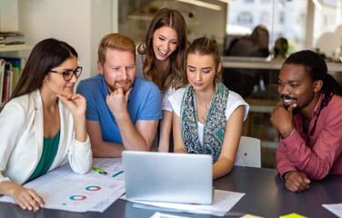 Group of happy multiethnic success business people working and brainstorming in corporate office