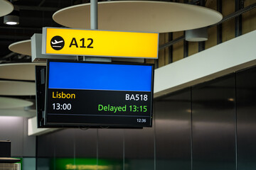 Airport flight/gate information board for flight to Lisbon