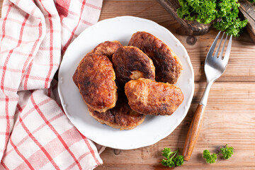 Cutlets. Fried cutlets on a table. Top view