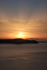 Fototapeta premium Amazing golden sunset at Santorini in Greece