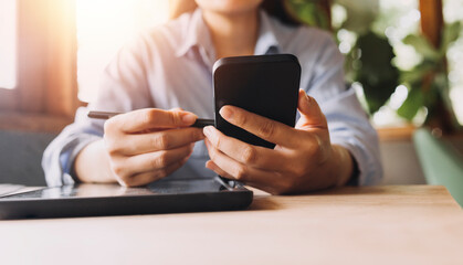 Business team present. professional investor working new start up project. Finance managers meeting.Digital tablet docking screen computer design smart phone using, in morning light