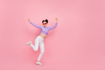 Fototapeta na wymiar Full length body size view of attractive cheerful slender girl having fun disco club isolated over pink pastel color background