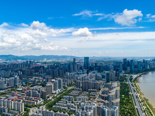 Obraz premium Aerial photography of urban landscape under blue sky and white clouds, Nanchang, Jiangxi