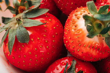 Fresh ripe juicy strawberries in a bowl close-up