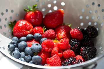 A mixture of fresh berries washed with water