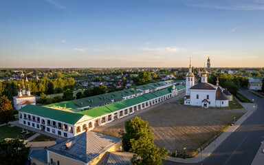 Aerial views of Russian Golden Ring town Suzdal on a sunrise (aerial drone photo). Suzdal, Russia - obrazy, fototapety, plakaty