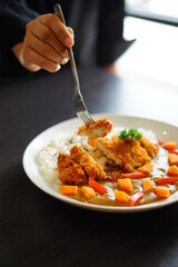 grilled chicken steak with red curry sauce and rice 