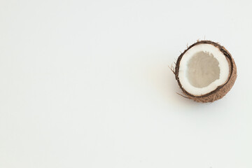 Coco. Coconut half isolated. Cocos white. Full depth of field.