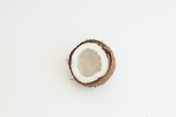 Coco. Coconut half isolated. Cocos white. Full depth of field.