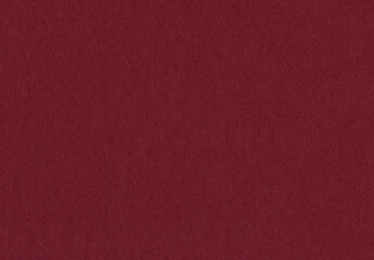 High detail large image close up of an maroon, crimson, dark red uncoated paper texture background scan with smooth grain fiber with copyspace for text for mock up and high resolution wallpaper