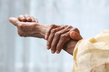 Elderly woman suffering from pain isolated on white 