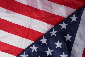 Concept of Independence day or Memorial day. Flag over bright marble table background.