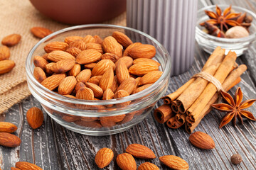 almond nuts on wood background