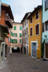 Fototapeta na wymiar An empty side-street near the harbour: Via del Faggio, near Piazzetta San Rocco, Riva del Garda, Trento, Trentino Alto Adige, Italy