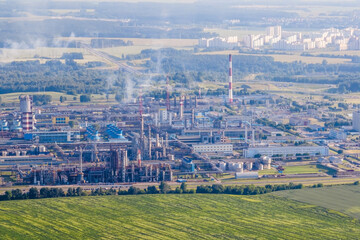 aerial view on pipes of chemical enterprise plant. Air pollution concept. Industrial landscape environmental pollution waste of thermal power plant
