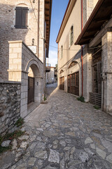 Fototapeta premium Street view in Dimitsana, a picturesque mountain village, built like am amphitheatre, surrounded by mountain tops, Arcadia, Peloponnes, Greece.