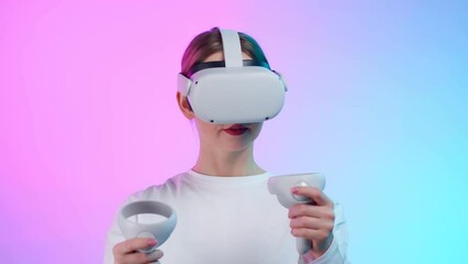 Woman play game with vr device controlling avatar in metaverse isolated in neon background