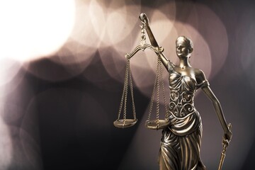 Statue of justice on a background, law concept