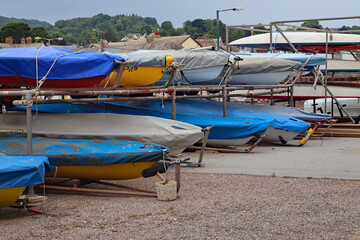 Dinghies stored in racks at the Sidmouth sailing club in Sidmouth in Devon, England