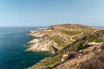 Fototapeta na wymiar View of La Revellata, a rocky promontory on the west coast of Corsica near Calvi