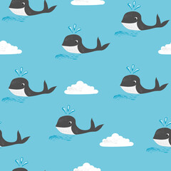 Obraz premium seamless pattern with whales and clouds in cartoon style for textile, background, paper