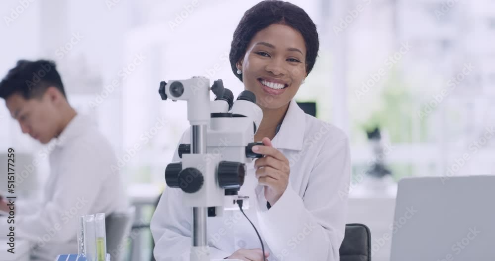 Aufkleber portrait of scientist using a microscope in a lab to analyze medical samples. happy black woman smil