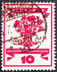 GERMANY - CIRCA 1919 : Cancelled postage stamp printed by Germany, that shows Tree, celebrating of Opening of the National Assembly, Weimar: Symbols, circa 1919.