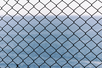 Fototapeta premium chain link fence with sky