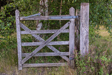 Fototapeta na wymiar Old wooden five bar gate
