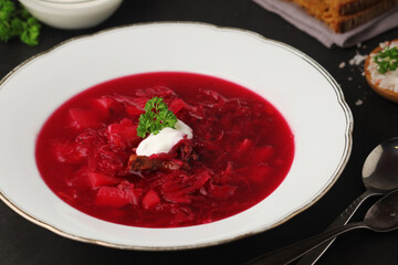 A plate with Ukrainian national dish - borsch