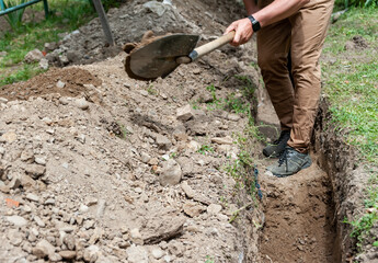 In cities where it is impossible for an excavator to work, you have to dig a trench by hand with an...