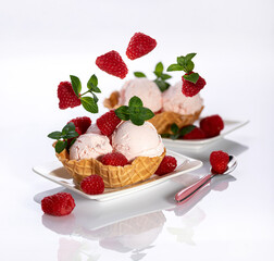 raspberry ice cream with berries on a light background