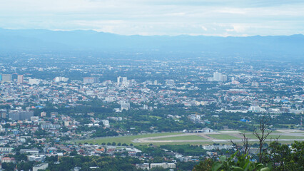 Chiang Mai City, bird's eye view from Doi Suthep, a city surrounded by trees, July 4, 2022 in Chiang Mai, Thailand (Industrial Concept) City