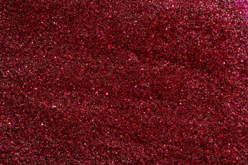 Red glitter nail polish texture. Celebration holiday background