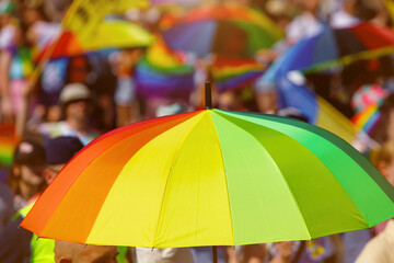 Rainbow umbrella in the city. Lgbt pride.