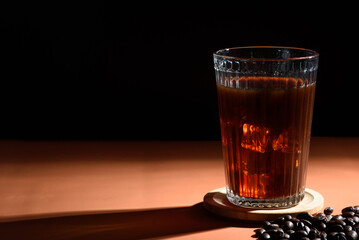 Iced Americano coffee with coffee beans